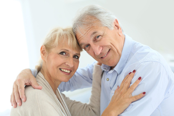 Senior man embracing his wife - Photo, image