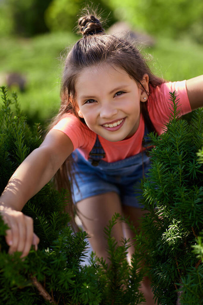 portrait of happy child girl in the park - Photo, image