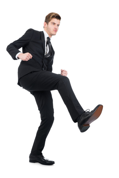 Angry Businessman Kicking - Foto, afbeelding