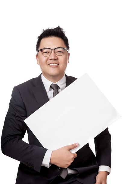 Asian businessman show a obliquely blank sign - Zdjęcie, obraz