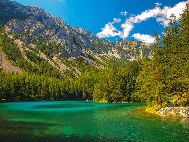 Mountains and turquoise lake - Fotografie, Obrázek