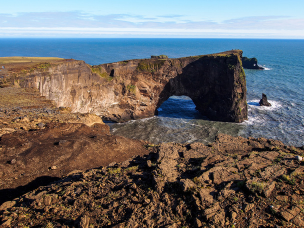 Arc rocheux naturel - Dyrholey Islande
 - Photo, image