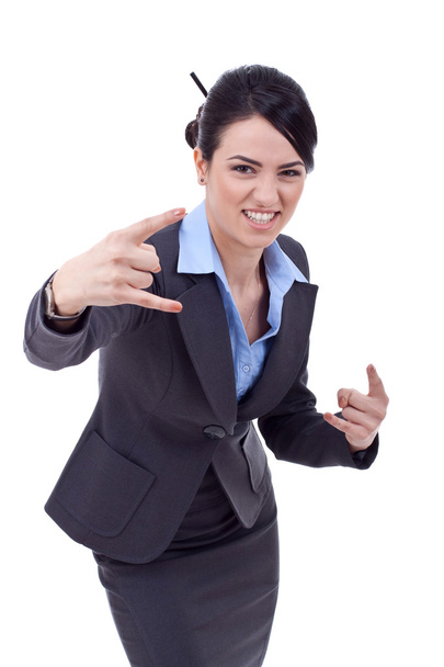 γυναίκα των επιχειρήσεων κάνει ένα σημάδι της ροκ εν ρολ - Φωτογραφία, εικόνα