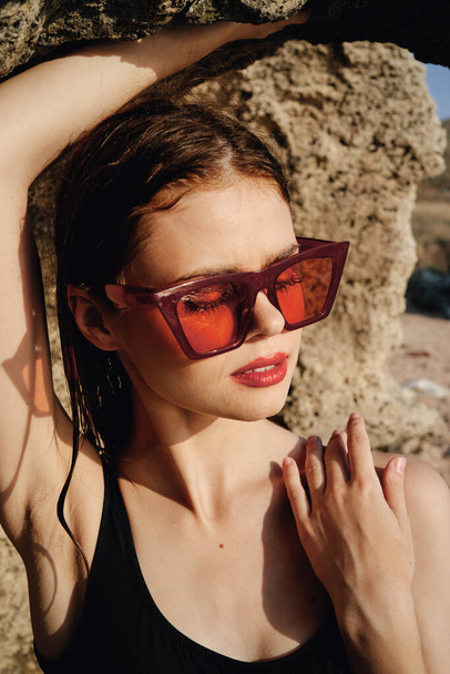 pretty woman in black swimsuit sunglasses posing sun - Zdjęcie, obraz