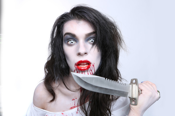 Psychotic Bleeding Woman in a Horror Themed Image - 写真・画像