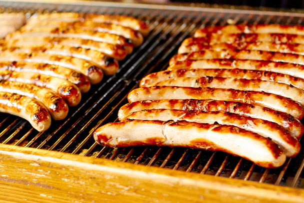 Sausages on the barbecue grill - Photo, Image