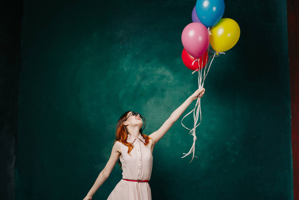 cheerful woman with colorful balloons holiday fun - Photo, Image