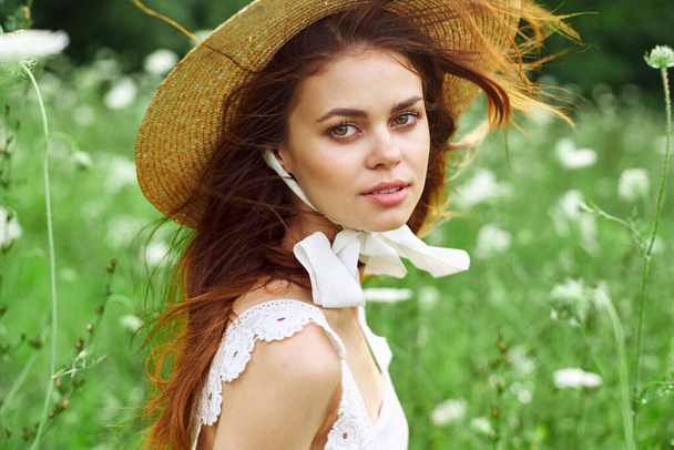 pretty woman with hat nature field flowers fresh air - Foto, Imagem