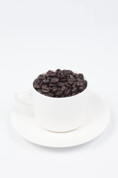 Coffee cup with coffee beans - Фото, изображение