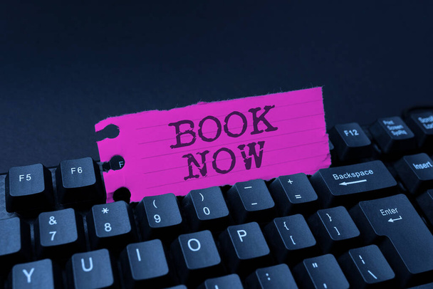 Hand writing sign Book Now. Conceptual photo Make a reservation in hotel accommodation or airplane ticket Typing Advance Lesson And Lecture Plans, Typewriting New Article Pages - Photo, Image
