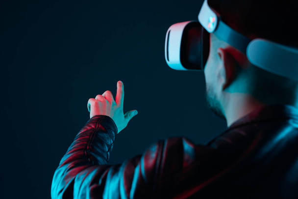 Man in VR glasses touching virtual reality - Zdjęcie, obraz