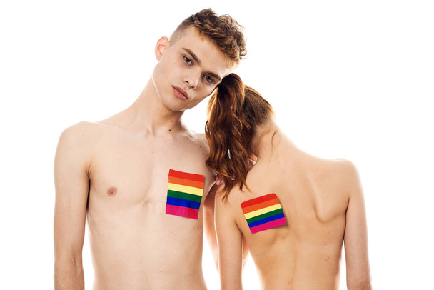 couple in white t-shirts Flag lgbt transgender sexual minorities - Foto, imagen