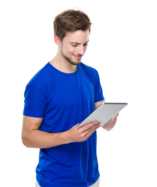 Man using digital tablet - 写真・画像