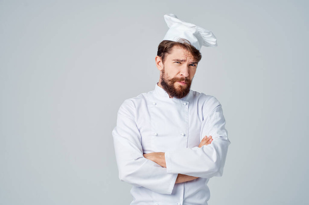 bearded man restaurant service Professional light background - Photo, image
