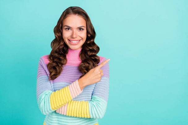 Photo of funky brunette millennial lady promote empty space wear violet sweater isolated on teal color background - Φωτογραφία, εικόνα