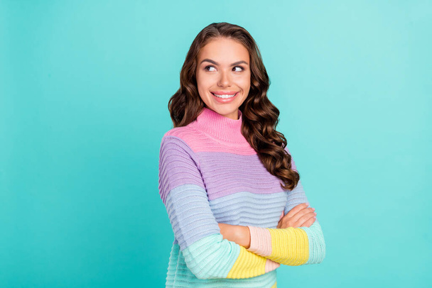 Photo of manager brunette millennial lady crossed arms look empty space wear striped pullover isolated on teal color background - Foto, Bild