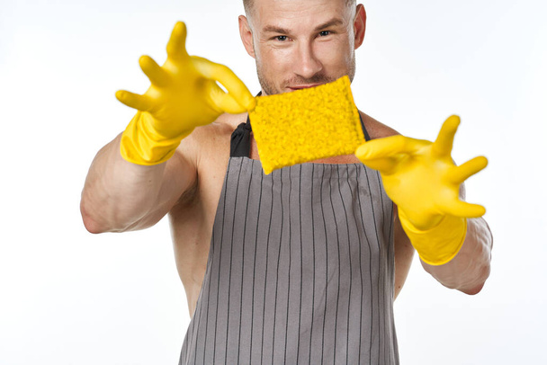 cleaner wearing an apron detergent cleaning housework - Φωτογραφία, εικόνα