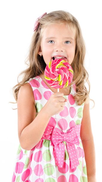 Happy little girl with lollipop isolated - Фото, зображення