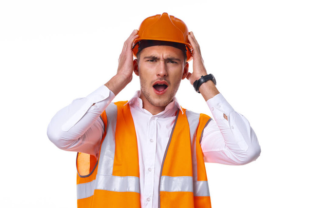 man in working orange uniform construction work - Zdjęcie, obraz