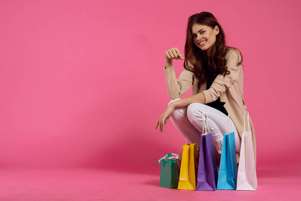 pretty woman multicolored packs emotions shopping fashion isolated background - Valokuva, kuva