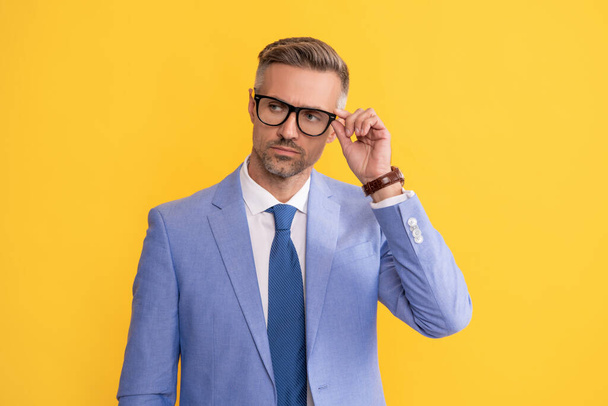 guy look like nerd. smart and confident businessman in suit. male fashion accessory. - Foto, imagen