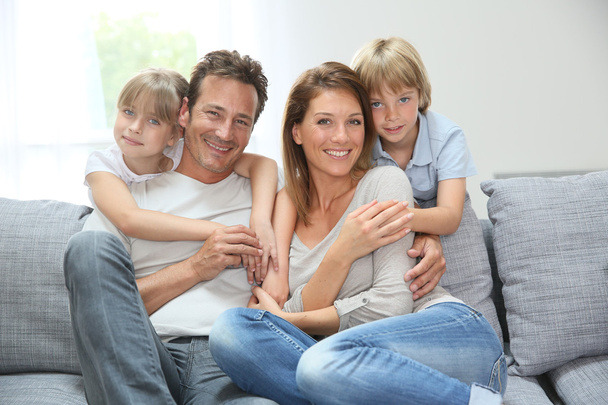 Family relaxing on couch - Photo, Image