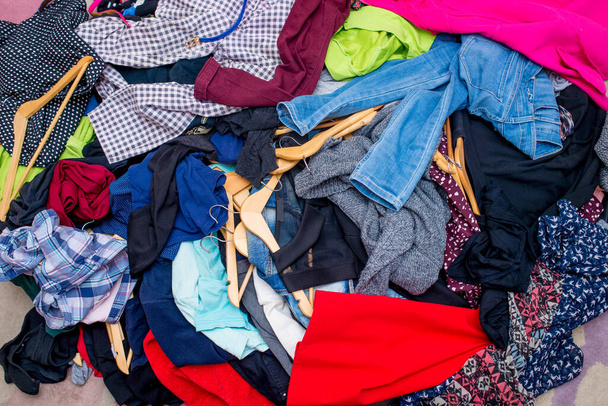 pile of used clothes. Second hand for recycling - Foto, afbeelding