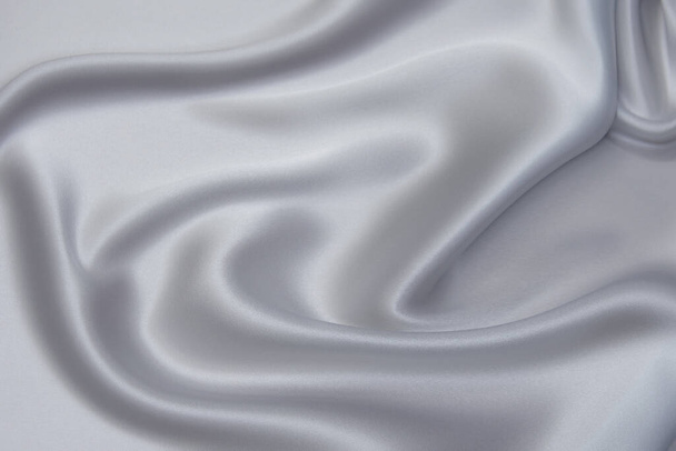 Elegant light gray fabric backgrounds. Metallic grey color of shiny textile, - Foto, immagini