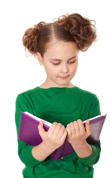 Interested girl reading book - Foto, imagen