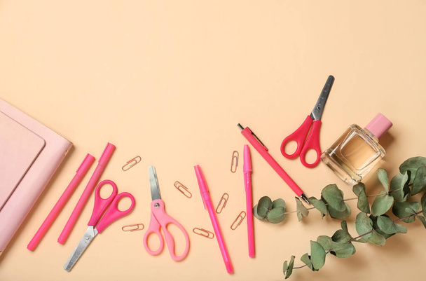 Composition with stationery and perfume on color background - Photo, Image