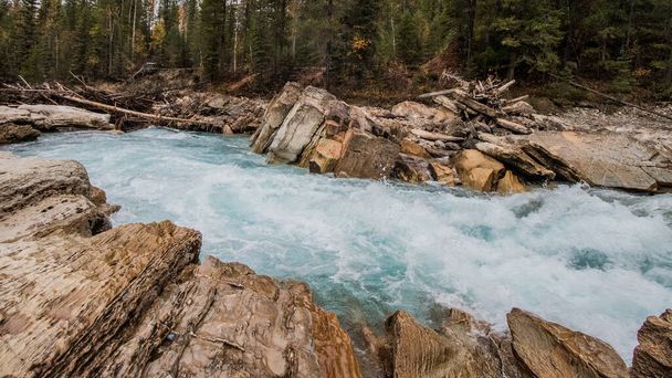 Water rushing over rocks in the Blaeberry River in British Columibia, Canada - Foto, Imagem