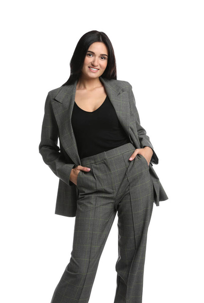 Beautiful woman in formal suit on white background. Business attire - Photo, Image