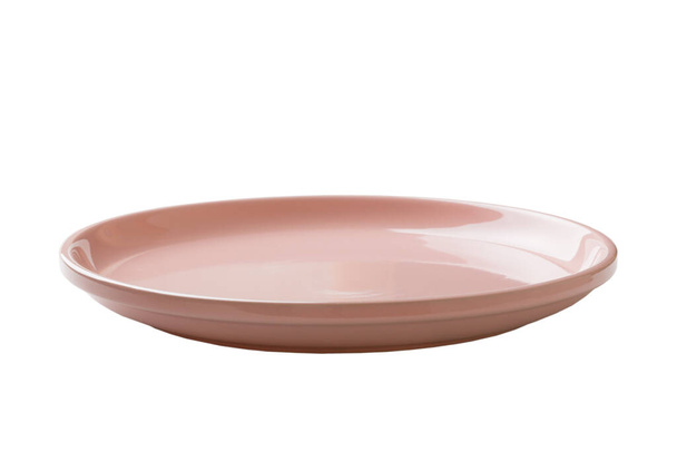 Placa redonda de cerâmica rosa isolada sobre fundo branco. perspectiva vista. - Foto, Imagem
