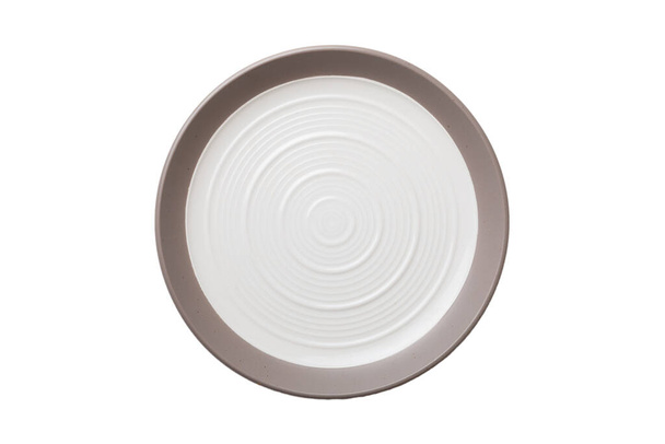 White ceramic round plate isolated over white background. Top view. - Photo, Image