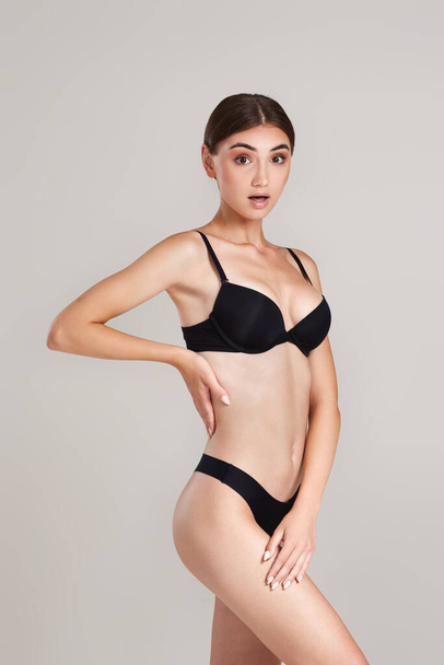 gorgeous slim woman with perfect body in black underwear - Valokuva, kuva
