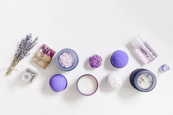 Products with lavender essential oil. Aromatherapy sleep spray, sea salt, bath bombs for Relaxation and Stress Relief. Natural cosmetic for beauty treatment and body care, herbal medicine - 写真・画像
