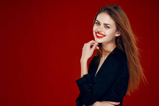 pretty woman with red lips red hair Glamor posing red background - Fotó, kép