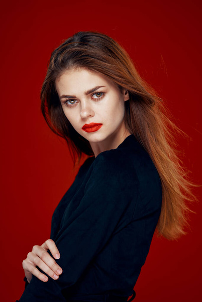 pretty woman with red lips red hair Glamor posing red background - Фото, зображення