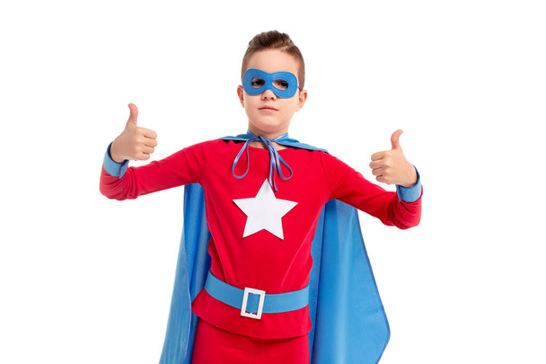 Superhero kid showing thumbs up - Foto, Imagem