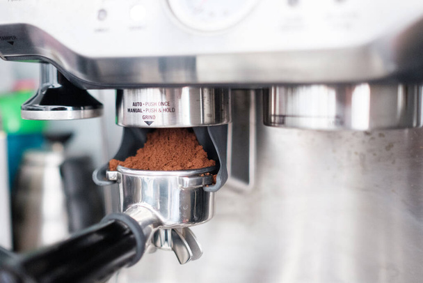 A beautiful shot of espresso coffee machine making a coffee - Fotó, kép