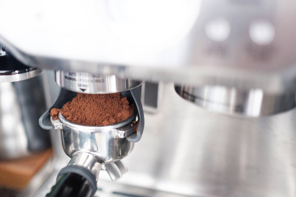 A beautiful shot of espresso coffee machine making a coffee - Fotoğraf, Görsel