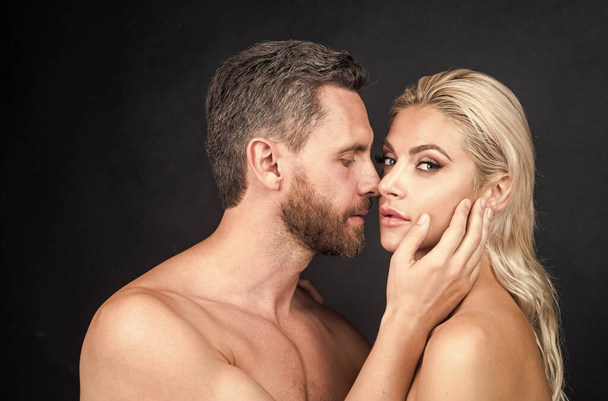 sexy couple in love of woman and man with naked body kiss, passion - 写真・画像