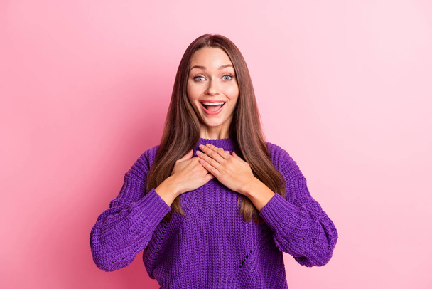 Portrait of impressed girl hands chest wear lilac sweater isolated on pastel pink color background - Фото, изображение