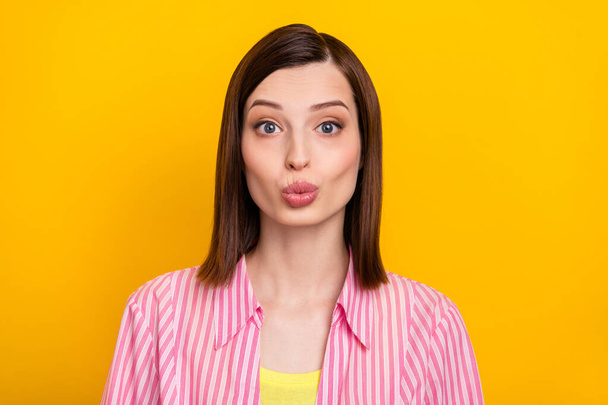 Portrait of pretty positive person kiss lips look camera have good mood isolated on yellow color background - Φωτογραφία, εικόνα