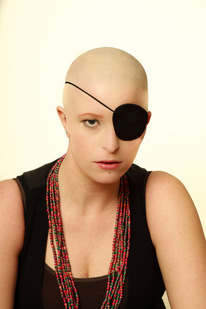 Bald girl with an eyepatch - Photo, Image