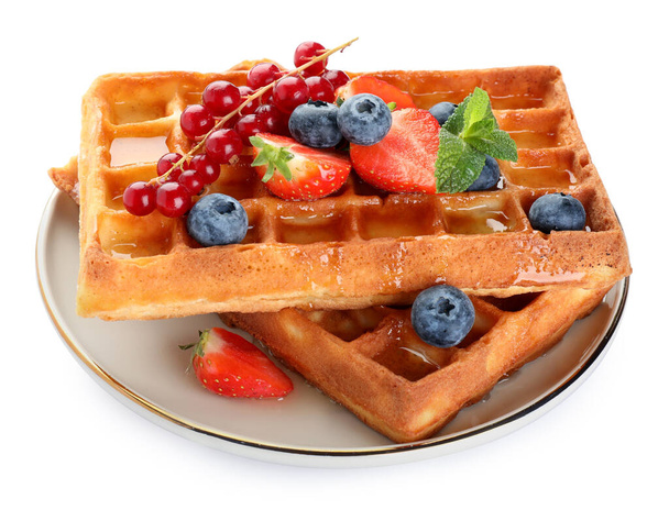 Delicious Belgian waffles with berries on white background - Foto, imagen