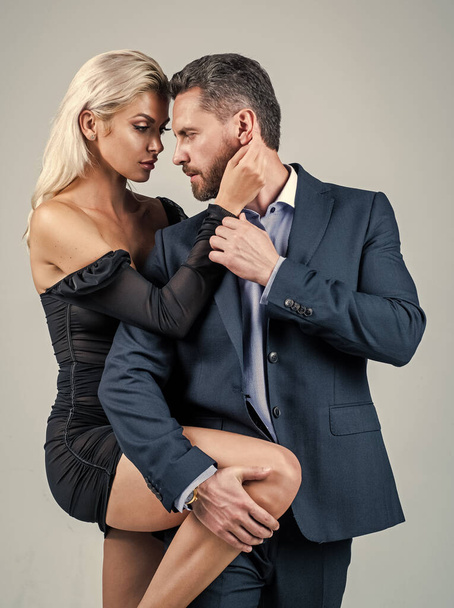 formal man and woman in love embrace having romantic relations, romance - Fotografie, Obrázek