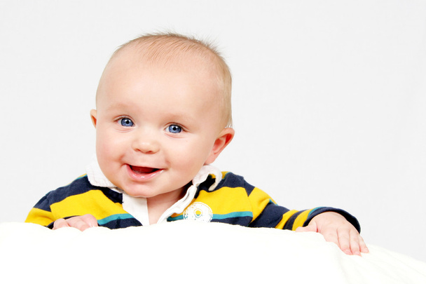 Cute little baby boy in striped shirt - Fotoğraf, Görsel