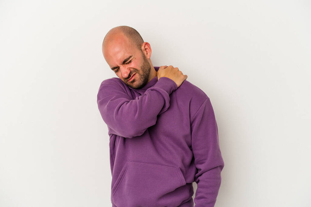 Young bald man isolated on white background having a shoulder pain. - Valokuva, kuva