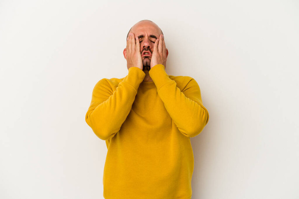 Young bald man isolated on white background whining and crying disconsolately. - Photo, Image